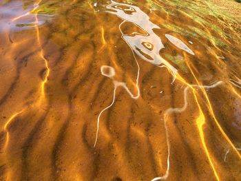 Full frame shot of water with reflection in lake