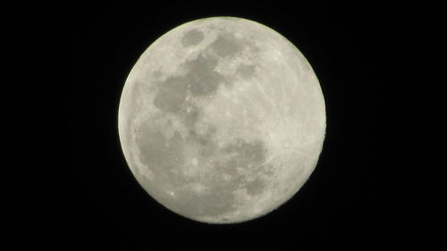 Close-up of moon against clear sky at night