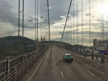 View of road against cloudy sky