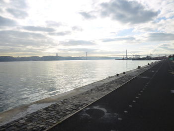 Bridge over sea against sky