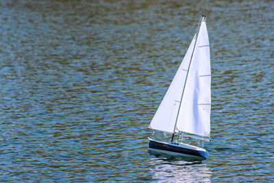 Sailboat sailing in sea