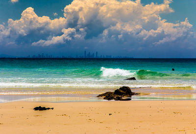 Scenic view of beach against sky