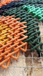 Full frame shot of multi colored pencils on metal