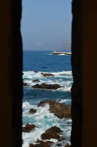 Scenic view of sea against clear sky