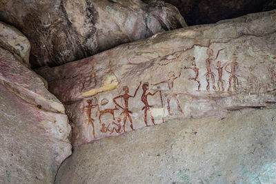 Close-up of text on rock