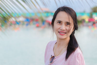 Portrait of smiling young woman