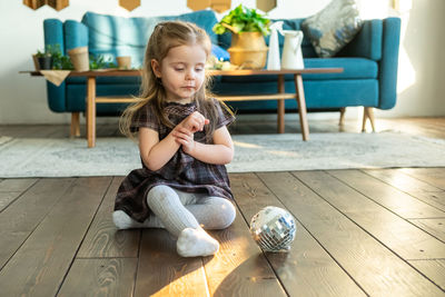 Cute girl playing at home