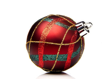 Close-up of multi colored ball against white background