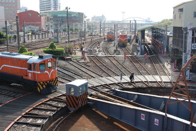 High angle view of train on railroad tracks in city