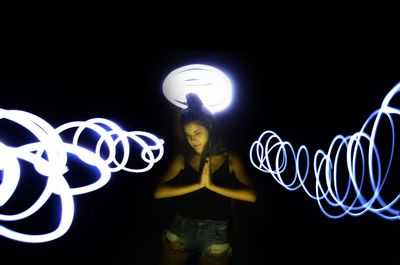 Illuminated light painting at night