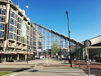 Low angle view of scaffoldings at rotterdam centraal station on sunny day