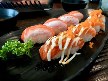 Close-up of sushi served on table