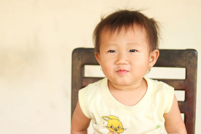 Portrait of cute boy at home