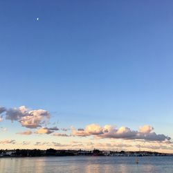 Scenic view of sea against blue sky