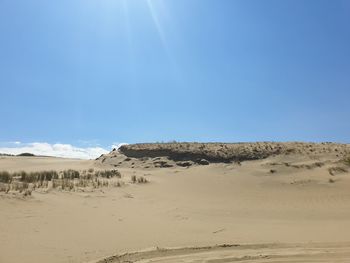 Scenic view of desert against sky