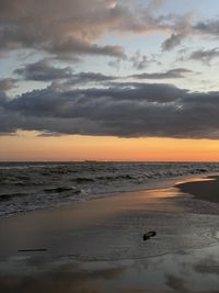 View of beach against sky during sunset