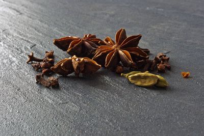 Close-up of spices on textured surface