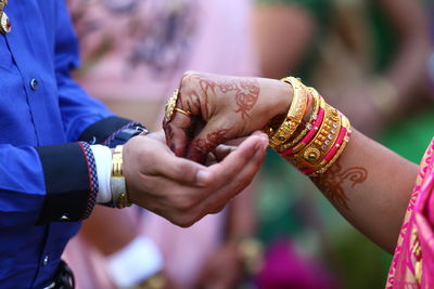 Close-up of couple during wedding ceremony