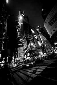 Low angle view of illuminated building at night