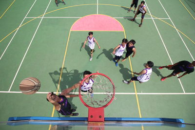 High angle view of people playing soccer ball