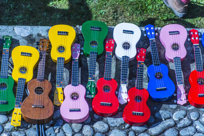 High angle view of colorful guitars