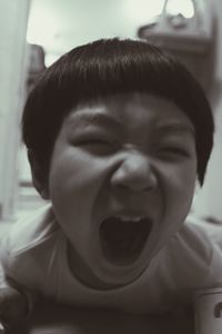 Close-up portrait of young woman