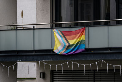 Low angle view of people walking in city