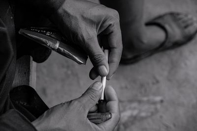 Close-up of man smoking cigarette