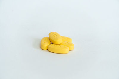 High angle view of eggs in container on white background