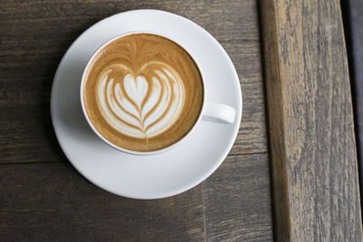 Directly above shot of cappuccino on table