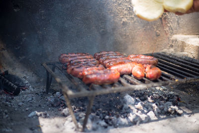 Close-up of meat on barbecue grill