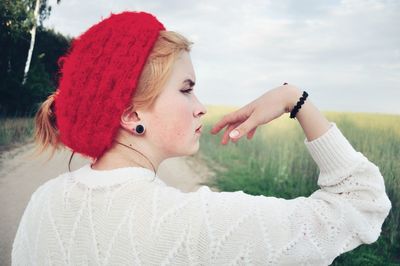 Portrait of a young woman looking away
