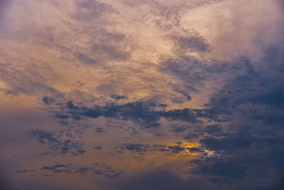 Low angle view of dramatic sky during sunset