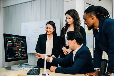 Business colleagues working at office