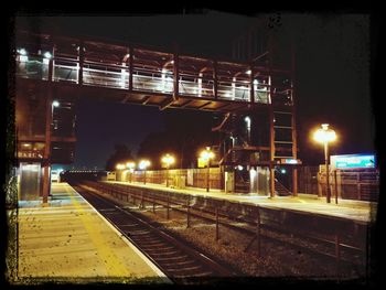 Railroad tracks at night