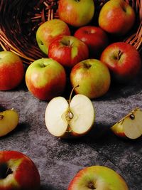 High angle view of apples in basket on table