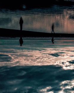 Full frame shot of silhouette water against sky