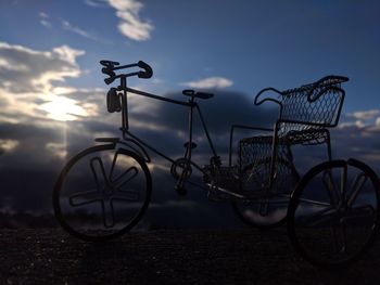 Bicycle parked against wall