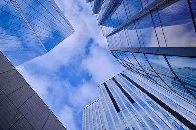 Low angle view of skyscraper against sky