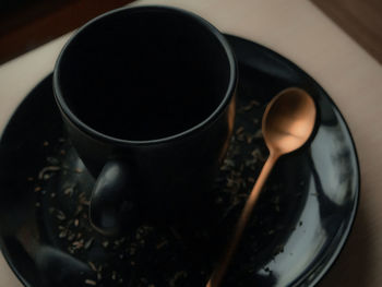 High angle view of coffee cup on table