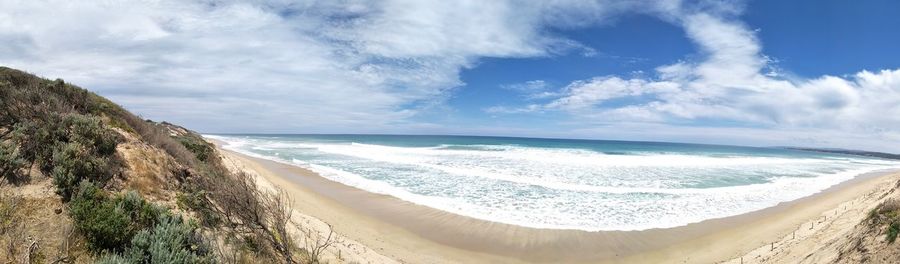 Panoramic view of beach against sky