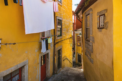 Narrow street amidst buildings in town