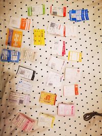 Directly above shot of multi colored pencils over black background