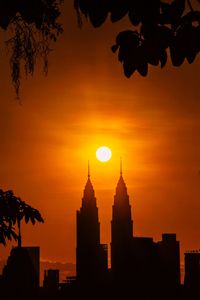 Silhouette of buildings at sunset