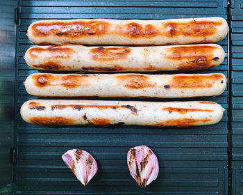 High angle view of meat on barbecue grill