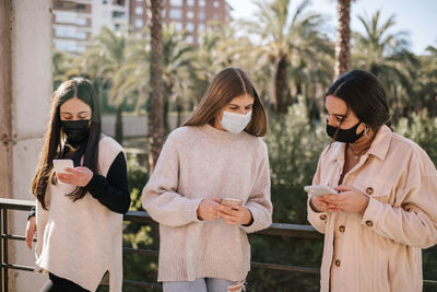 Young woman using smart phone