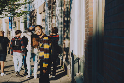 Group of people walking in building