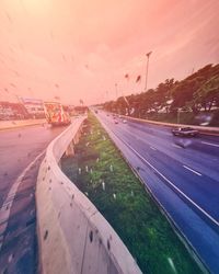 Road in city at sunset