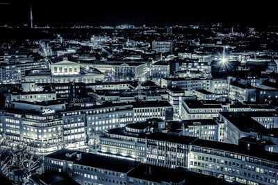 High angle view of illuminated buildings at night