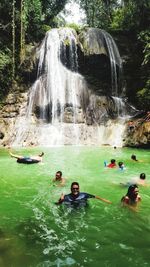 People enjoying in water